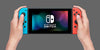 Nintendo Switch with Neon Blue and Neon Red Joy‑Con